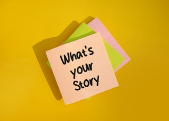 What's your story. Inspirational motivational quotes on note paper. Yellow background.