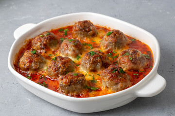 Meatballs with cheddar in the oven. Turkish name; Firinda kasarli kofte