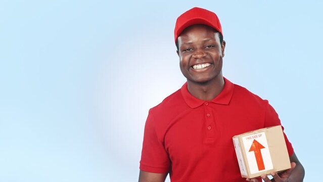 Happy black man, box and pointing for delivery advertising, options or logistics against a studio background. Portrait of African person or courier guy showing list, steps or information on mockup