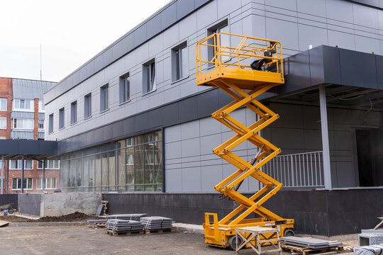 mobile lifting cradle. Construction scissor lift.