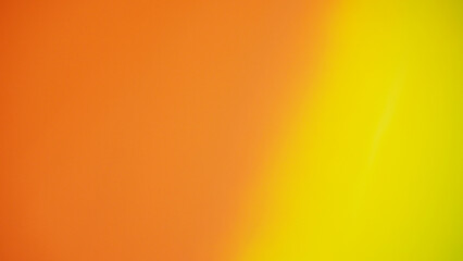 Defocused Abstract orange and yellow texture Background shotten from wall