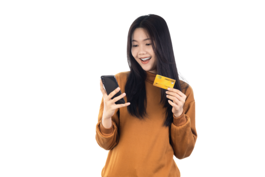 Asian woman holding credit card and looking at smartphone app, buying, order delivery in mobile phone application, standing isolated on white background with clipping path. Online shopping concept.