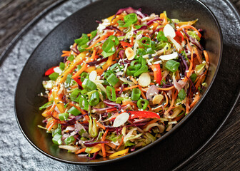 asian slaw, crunchy oriental cabbage salad in bowl