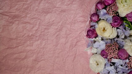 Floral natural pink background with blue gardenia, rose, white chrysanthemum close-up. Copy space, copy past, paste text