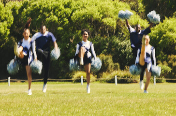 Motion blur, support and a cheerleader group of young people outdoor for a training routine or sports event. Energy, teamwork and diversity with a happy cheer squad on a field together for motivation