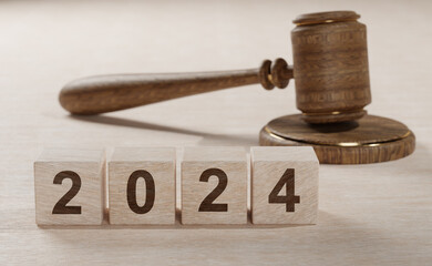 2024 New Year and judge's gavel on table. Justice, Law, lawyer, judgment, justice auction and...