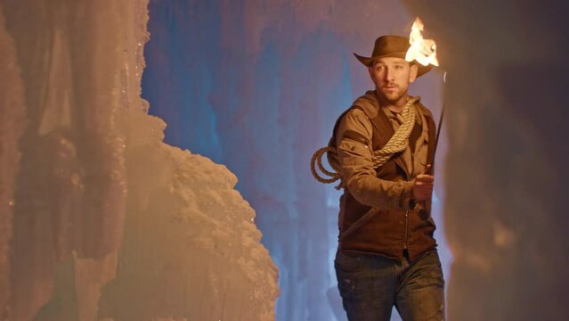 Exploring Ice Cave With Torch - Slow Motion