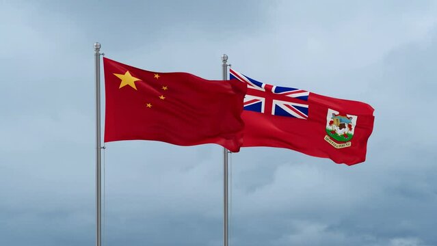 China flag and Bermuda or Somers Isles flag waving together on cloudy sky, endless seamless loop