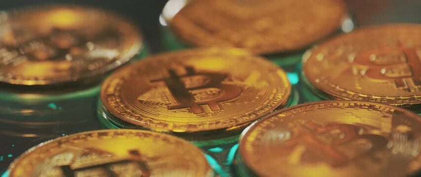 Detailed close-up shot over golden bitcoin cash coin; fire flames on the coin