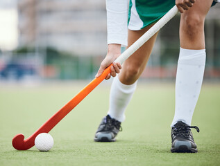 Woman athlete, hockey and field with exercise for game goal training or running, workout on grass...