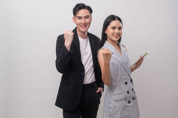 Young Asian couple smiling over white background