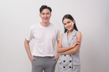 Young Asian couple smiling over white background