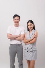 Fototapeta premium Young Asian couple smiling over white background