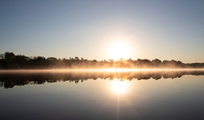 Landscape with a sunrise on the river