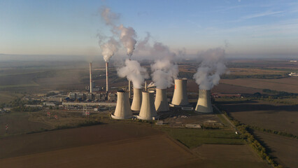 aerial view of coal fired power station and Combined cycle power plant at sunrise, Pocerady, Czech republic