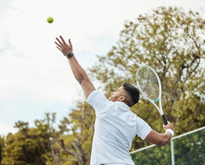Man, tennis and serve with fitness on court and start game, sports and athlete, performance and competition. Health, energy and professional player on outdoor turf, exercise and racket during match