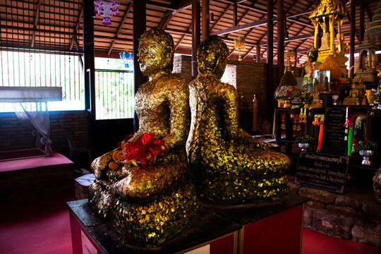 Beautiful ancient buddha and antique ubosot of Wat Mahathat Worawihan temple for thai people travelers travel visit respect praying blessing holy wish myth on September 16, 2023 in Ratchaburi Thailand