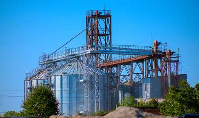 Photo of elevator building against blue sky