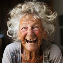 cheerful granny with disheveled gray hair laughs infectiously with her mouth open in her kitchen, close-up. generated by AI
