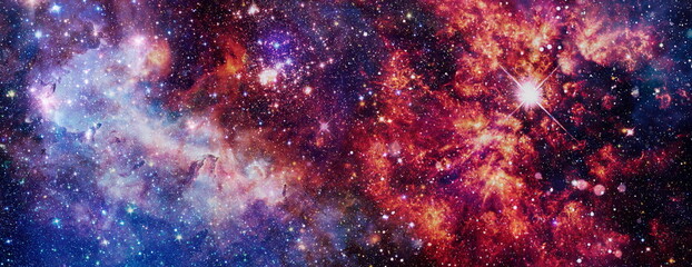Multicolor outer space. Star field and nebula in deep space many light years far from planet Earth. Elements of this image furnished by NASA. - obrazy, fototapety, plakaty
