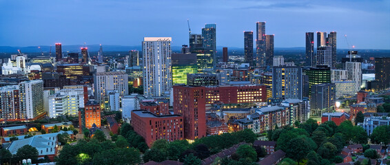 Panoramic photo of Manchester skyline during the early hours of evening
