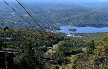 view from top of Mont-Tremblant along the chairlift towards Lake Superieur  the Laurentian mountains, Autumn scene
