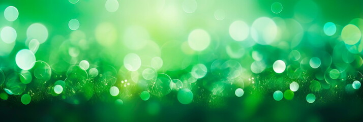 Fototapeta premium abstract background with bokeh lights in shades of green, evoking a tranquil forest setting.