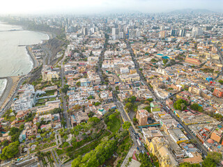 Fototapeta na wymiar Aerial view of La Santisima Cruz Parish next to the Barranco neighborhood in Lima, Peru in 2023. Next to the Spanish Ambassador's Residence and Saint Francis of Assisi Parish.