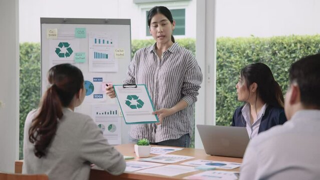 Carbon offset price report CO2 emission. Future growth Net zero waste in ESG office protect climate change global warming social issues project. Group asia woman people SDGs plan team talking workshop