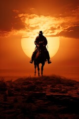 Fototapeta premium Cowboy riding a horse into sunset, only silhouette visible against orange sky. Wide banner with space for text. 