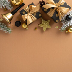 Dive into joy of Christmas with this captivating square arrangement. Top-view vertical image of gifts, lavish black, gold balls, star, shiny confetti, bell, frosty fir twigs on terracotta