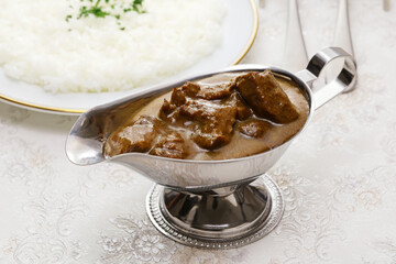Japanese-style beef curry rice ( curry and rice are served separately)
Japanese curry is always served with rice.
 - obrazy, fototapety, plakaty