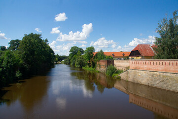 View at Elbe river from the 5.  Kvetna street bridge in summer. Jaromer, Czech Republic.