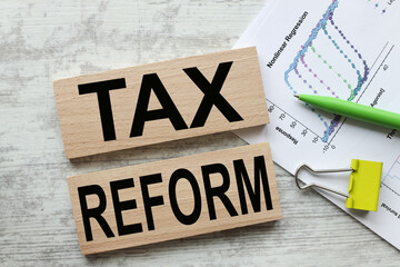 Tax Reforms. wooden blocks with text on the office table.