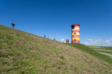 Fototapeta na wymiar Pilsum lighthouse in East Frisia, Germany
