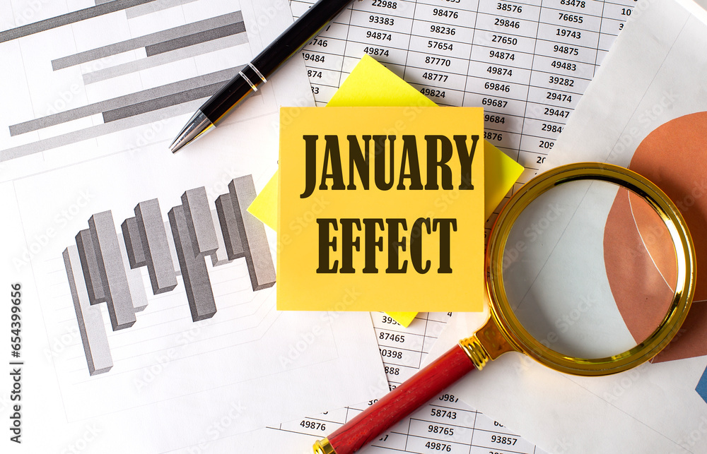 Poster january effect text on a sticky on the graph background with pen and magnifier