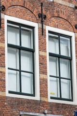 old brick wall with windows