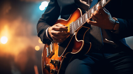 Obraz premium Music band group perform on a concert stage. Guitarist on stage for background, soft and blur concept. Music band performing in a recording studio