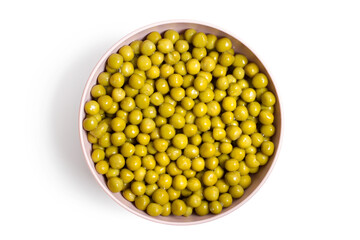 Canned green peas in a plate. Green peas on a white background. View from above.