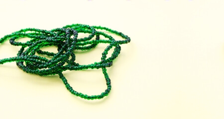 Small green plastic beads for jewelry