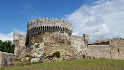 A majestic castle made of stone, surrounded by a sturdy fence, exuding an aura of strength and...