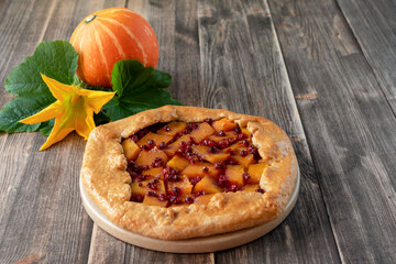 Galette with pumpkin and lingonberries. French brittany cuisine. - obrazy, fototapety, plakaty