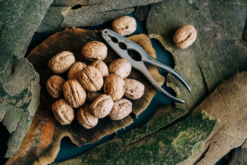 Walnuts on rustic wooden table