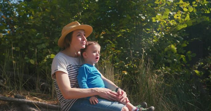 Mother And Son Enjoy Time in Nature. Hiking in public parkland