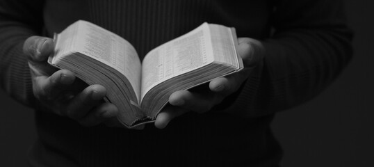 praying to God on grey black background with people stock image stock photo	