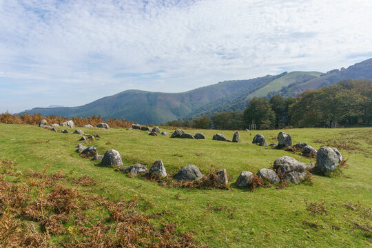 Stone circle Cromlech of Oianleku Harrespila with beautiful mountain landscape in autumn, Aiako Harria, Basque Country, Spain