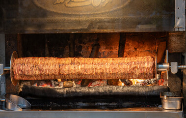 traditional turkish oltu cag crochet shish kebab doner grilled in wood fired oven. Famous yatik...