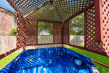 a hot tub in a back yard 