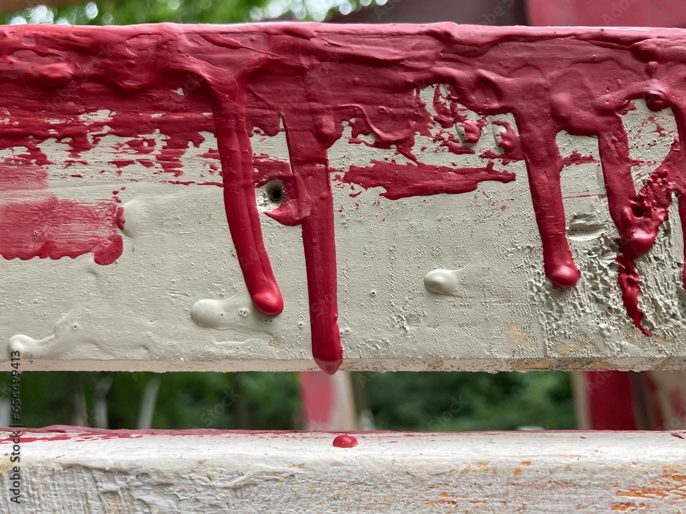 Wall mural red dried paint against grungy background