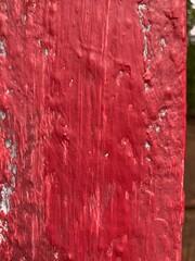 Red dried paint against grungy background